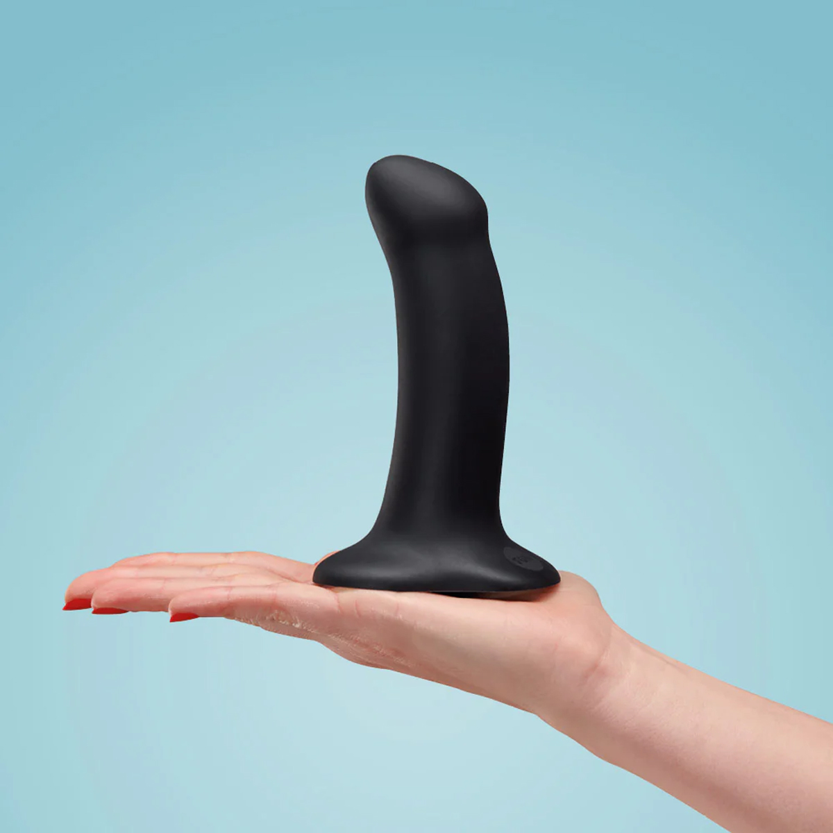 Amor dildo sex toy in women hand